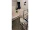 Small bathroom with shower/tub combo, and storage at 3315 58Th S Ave # 218, St Petersburg, FL 33712
