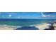 Wide shot of the ocean and beach from the property, highlighting the beautiful coastal setting at 15316 Gulf Blvd # 604, Madeira Beach, FL 33708