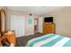 Bedroom featuring neutral paint, a closet and dresser at 15316 Gulf Blvd # 604, Madeira Beach, FL 33708