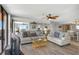 Bright living room with sliding doors to balcony and stylish furnishings at 15316 Gulf Blvd # 604, Madeira Beach, FL 33708