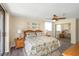 Comfortable bedroom with a ceiling fan, lamps and mirrored closet doors at 15316 Gulf Blvd # 604, Madeira Beach, FL 33708