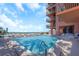 Gorgeous swimming pool with ocean views and comfortable lounge chairs offers a relaxing outdoor experience at 15316 Gulf Blvd # 604, Madeira Beach, FL 33708