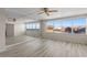 Spacious bedroom with mirrored wall and water view at 5200 Brittany S Dr # 4-1102, St Petersburg, FL 33715