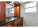 Bathroom with vanity, granite countertop, and mirror at 5200 Brittany S Dr # 4-1102, St Petersburg, FL 33715