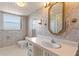 Bathroom with vintage wallpaper and updated sink at 5200 Brittany S Dr # 4-1102, St Petersburg, FL 33715