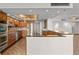 Updated kitchen, granite counters, and wood cabinets at 5200 Brittany S Dr # 4-1102, St Petersburg, FL 33715