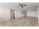 Bright living room with wood-look floors at 5200 Brittany S Dr # 4-1102, St Petersburg, FL 33715