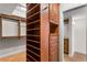 Large walk-in closet with ample shelving and hanging space at 5200 Brittany S Dr # 4-1102, St Petersburg, FL 33715