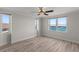 Bright bedroom with hardwood floors and water views at 5200 Brittany S Dr # 4-1102, St Petersburg, FL 33715