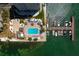 Bird's-eye view of waterfront building, pool, and docks at 5200 Brittany S Dr # 4-1102, St Petersburg, FL 33715