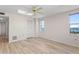 Bright bedroom with water views and closet at 5200 Brittany S Dr # 4-1102, St Petersburg, FL 33715