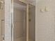 Shower with tiled walls at 5200 Brittany S Dr # 4-1102, St Petersburg, FL 33715