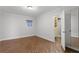 Bright bedroom with tile flooring and walk-in closet at 5200 Brittany S Dr # 4-1102, St Petersburg, FL 33715