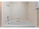 Clean bathroom with tiled tub and shower at 5200 Brittany S Dr # 4-1102, St Petersburg, FL 33715