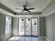 Bright bedroom with water views and tiled floors at 211 Dolphin Pt # 201, Clearwater, FL 33767