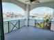 Spacious balcony offering stunning waterfront views and a relaxing atmosphere at 211 Dolphin Pt # 302, Clearwater, FL 33767