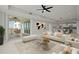 Bright and airy living room with marble flooring, open floor plan and water views at 211 Dolphin Pt # 302, Clearwater, FL 33767