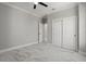 Spacious bedroom with marble floors and a private door at 211 Dolphin Pt # 302, Clearwater, FL 33767