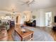Open concept living room with a seating area and adjacent dining and kitchen areas at 960 Starkey Rd # 2303, Largo, FL 33771