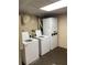 Shared laundry room with coin-operated washer and dryer at 10033 64Th N Ave # 1, St Petersburg, FL 33708