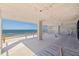 Spacious balcony with ocean views, ready for customization with flooring and finishing touches at 14048 Gulf Blvd # 402, Madeira Beach, FL 33708