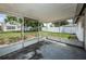 Screened porch overlooking backyard at 3423 Eisenhower Dr, Holiday, FL 34691
