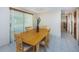 Dining room with sliding door access to the backyard at 3423 Eisenhower Dr, Holiday, FL 34691