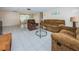 Spacious living area with ample seating and a dining area at 3423 Eisenhower Dr, Holiday, FL 34691