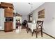 Dining area with hardwood floors and views to kitchen at 33466 Westwood Dr Dr, Ridge Manor, FL 33523