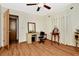 Bright bedroom with a desk, chair, and large windows that let in plenty of natural light at 33466 Westwood Dr Dr, Ridge Manor, FL 33523