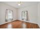 Bright bedroom with hardwood floors and neutral walls at 2026 Auburn S St, St Petersburg, FL 33712