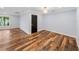 Spacious bedroom with hardwood floors and neutral walls at 2441 69Th S Ave, St Petersburg, FL 33712
