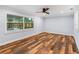 Bright bedroom featuring hardwood floors and a large window at 2441 69Th S Ave, St Petersburg, FL 33712