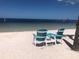 Relaxing beach view with comfortable chairs at 5537 Sea Forest Dr # 302, New Port Richey, FL 34652