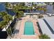 Elevated view of community pool and lounge area at 5537 Sea Forest Dr # 302, New Port Richey, FL 34652