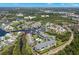 Aerial view of community, showing location and pool at 5537 Sea Forest Dr # 302, New Port Richey, FL 34652