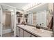 Double vanity bathroom with a tub and shower at 5537 Sea Forest Dr # 302, New Port Richey, FL 34652