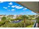 Scenic view of the waterfront with boats and houses at 5537 Sea Forest Dr # 302, New Port Richey, FL 34652
