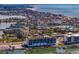 Amazing aerial view of the condo, with artificial turf on rooftop and waterway filled with boats at 400 150Th Ave # 304, Madeira Beach, FL 33708