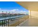 Spacious balcony overlooking a picturesque waterfront community with beautiful water views at 400 150Th Ave # 304, Madeira Beach, FL 33708
