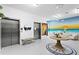 Elegant lobby with modern decor, elevators, seating, and decorative art pieces at 400 150Th Ave # 304, Madeira Beach, FL 33708