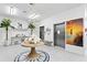 Elegant lobby featuring modern decor, artwork, and elevator access at 400 150Th Ave # 304, Madeira Beach, FL 33708