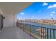 Balcony view overlooking water and docks from this condo with a metal railing at 400 150Th Ave # 305, Madeira Beach, FL 33708
