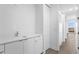 This stylish bathroom features a modern vanity and cabinets with a large mirror and ample storage space at 400 150Th Ave # 305, Madeira Beach, FL 33708
