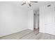 Spacious bedroom featuring light hardwood floors, white walls, and modern doors and trim at 400 150Th Ave # 305, Madeira Beach, FL 33708