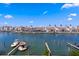 Beautiful view of the waterfront community with houses and boats on the water at 400 150Th Ave # 305, Madeira Beach, FL 33708