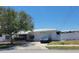 Single-story home with attached garage and spacious yard at 15318 Harbor Dr, Madeira Beach, FL 33708