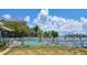 Residential pool with white vinyl fence at 15318 Harbor Dr, Madeira Beach, FL 33708