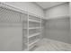 Spacious walk-in closet with ample shelving and hanging space at 211 Dolphin Pt # 501, Clearwater, FL 33767