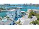 Aerial view of waterfront community with pool and boat slips at 211 Dolphin Pt # 501, Clearwater, FL 33767